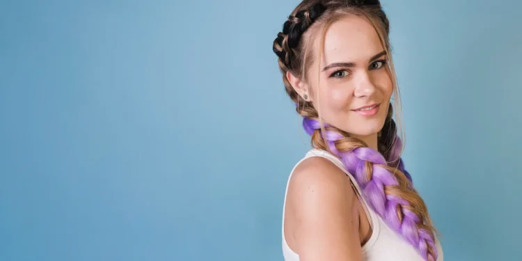 Girl has long ponytail braid