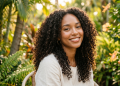 women with coconut oil and hair curls